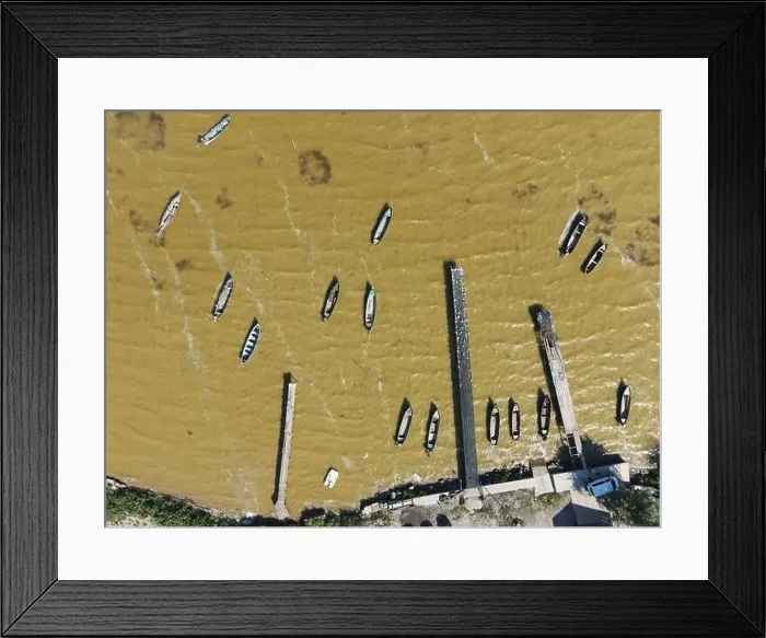 Framed Print : Fishing boats in a small village in Dobrogea, Romania. Aerial view Framed Print : Fishing boats in a small village in Dobrogea, Romania. Aerial view