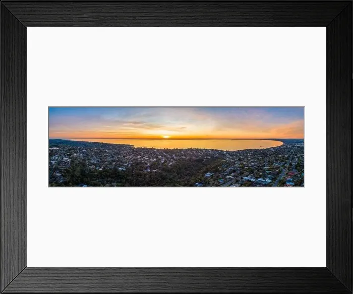 Framed Print : Scenic aerial view of Port Phillip Bay at sunset surrounded by residential area. Melbourne, Australia Framed Print : Scenic aerial view of Port Phillip Bay at sunset surrounded by residential area. Melbourne, Australia