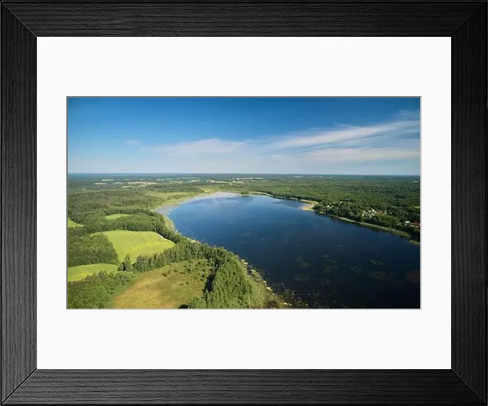 Framed Print : Pond in foresty background aerial drone view with blue sky Framed Print : Pond in foresty background aerial drone view with blue sky