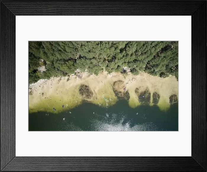 Framed Print : People on lake beach above top drone view in bright sunny day Framed Print : People on lake beach above top drone view in bright sunny day