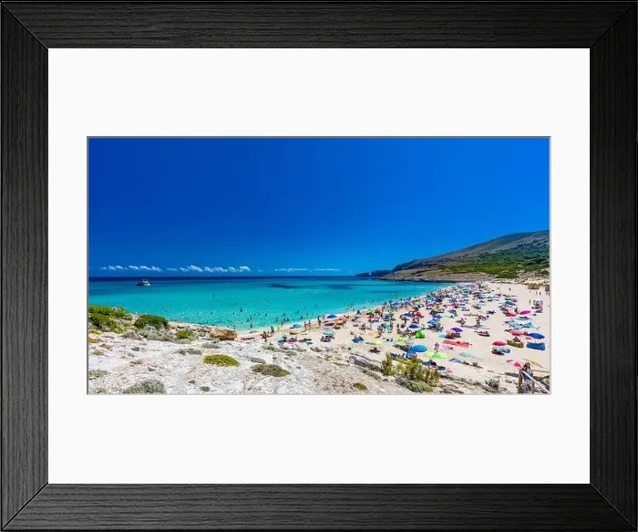 Framed Print : CALA MESQUIDA, MALLORCA, SPAIN - 19 July 2020: People enjoying beautiful sandy beach of on Mallorca Framed Print : CALA MESQUIDA, MALLORCA, SPAIN - 19 July 2020: People enjoying beautiful sandy beach of on Mallorca