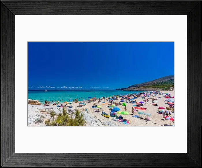 Framed Print : CALA MESQUIDA, MALLORCA, SPAIN - 19 July 2020: People enjoying beautiful sandy beach of on Mallorca Framed Print : CALA MESQUIDA, MALLORCA, SPAIN - 19 July 2020: People enjoying beautiful sandy beach of on Mallorca