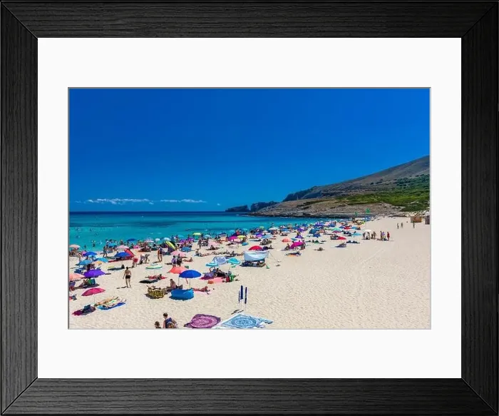 Framed Print : CALA MESQUIDA, MALLORCA, SPAIN - 19 July 2020: People enjoying beautiful sandy beach of on Mallorca Framed Print : CALA MESQUIDA, MALLORCA, SPAIN - 19 July 2020: People enjoying beautiful sandy beach of on Mallorca