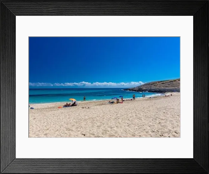 Framed Print : CALA MESQUIDA, MALLORCA, SPAIN - 19 July 2020: People enjoying beautiful sandy beach of on Mallorca Framed Print : CALA MESQUIDA, MALLORCA, SPAIN - 19 July 2020: People enjoying beautiful sandy beach of on Mallorca