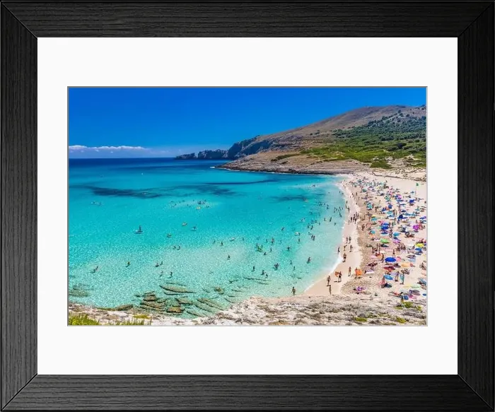 Framed Print : CALA MESQUIDA, MALLORCA, SPAIN - 19 July 2020: People enjoying beautiful sandy beach of on Mallorca Framed Print : CALA MESQUIDA, MALLORCA, SPAIN - 19 July 2020: People enjoying beautiful sandy beach of on Mallorca