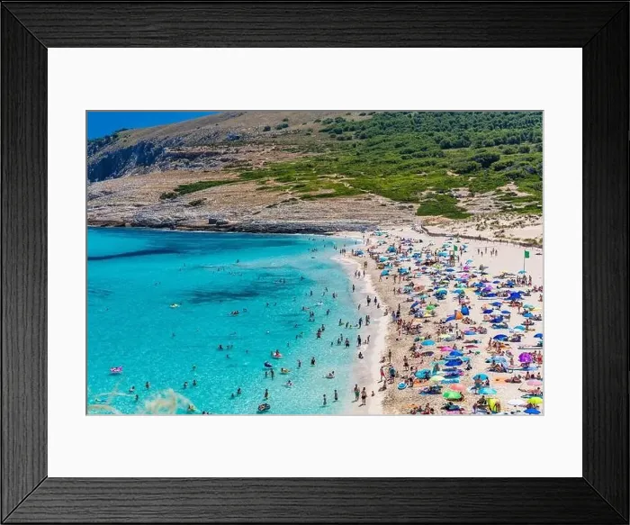 Framed Print : CALA MESQUIDA, MALLORCA, SPAIN - 19 July 2020: People enjoying beautiful sandy beach of on Mallorca Framed Print : CALA MESQUIDA, MALLORCA, SPAIN - 19 July 2020: People enjoying beautiful sandy beach of on Mallorca