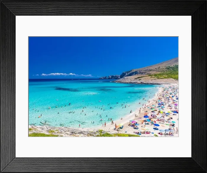 Framed Print : CALA MESQUIDA, MALLORCA, SPAIN - 19 July 2020: People enjoying beautiful sandy beach of on Mallorca Framed Print : CALA MESQUIDA, MALLORCA, SPAIN - 19 July 2020: People enjoying beautiful sandy beach of on Mallorca