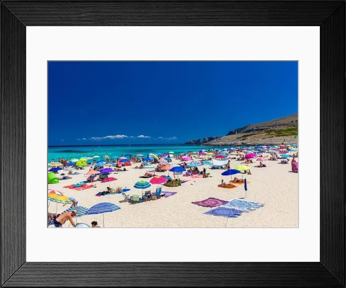 Framed Print : CALA MESQUIDA, MALLORCA, SPAIN - 19 July 2020: People enjoying beautiful sandy beach of on Mallorca Framed Print : CALA MESQUIDA, MALLORCA, SPAIN - 19 July 2020: People enjoying beautiful sandy beach of on Mallorca