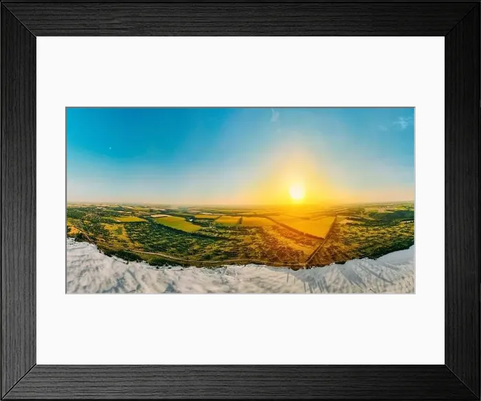 Framed Print : Border of desertification territory and green meadow with river is a result human destructive activity in environment