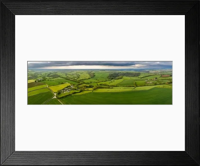 Framed Print : Aerial vista of rolling countryside near the village of Coldridge, Devon, England, United Kingdom, Europe Framed Print : Aerial vista of rolling countryside near the village of Coldridge, Devon, England, United Kingdom, Europe
