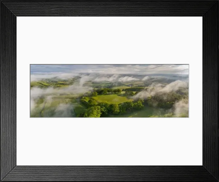Framed Print : Aerial vista of Cadbury Castle Iron Age Hillfort, Devon, England, United Kingdom, Europe Framed Print : Aerial vista of Cadbury Castle Iron Age Hillfort, Devon, England, United Kingdom, Europe