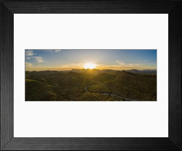 Framed Print : Aerial panorama over the Arizona desert during sunset with mountains and a meandering dry stream Framed Print : Aerial panorama over the Arizona desert during sunset with mountains and a meandering dry stream