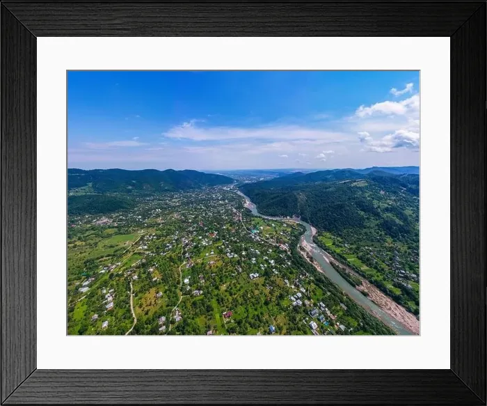 Framed Print : Aerial drone view of green mountain, pine forest, river and village. Carpathian, Ukraine Framed Print : Aerial drone view of green mountain, pine forest, river and village. Carpathian, Ukraine