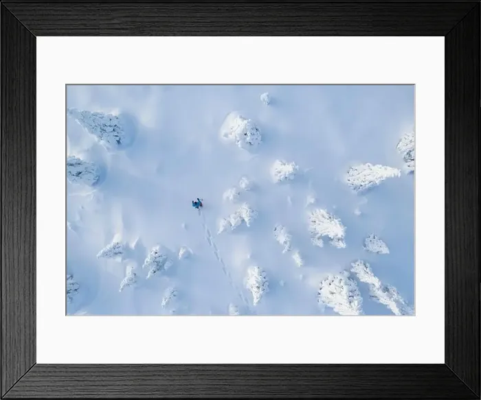 Framed Print : Aerial view of snowshoes walker in snowy spruce forest. Winter outdoor leasure activity and extreme sport Framed Print : Aerial view of snowshoes walker in snowy spruce forest. Winter outdoor leasure activity and extreme sport