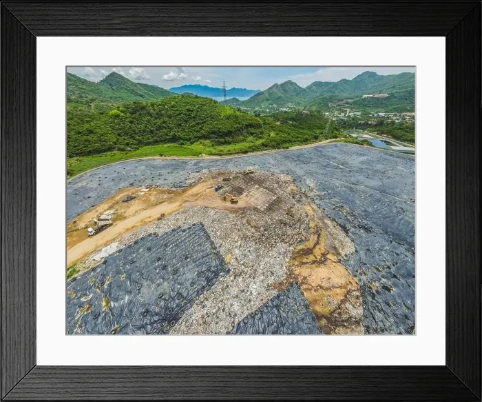 Framed Print : Aerial top view photo from flying drone of large garbage pile Framed Print : Aerial top view photo from flying drone of large garbage pile