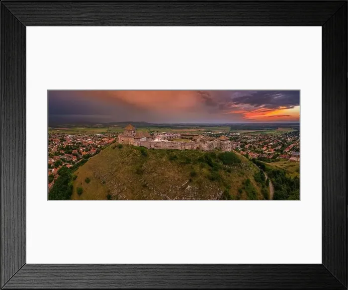 Framed Print : Sumeg, Hungary - Aerial panoramic view of the famous High Castle of Sumeg in Veszprem county at sunset with storm Framed Print : Sumeg, Hungary - Aerial panoramic view of the famous High Castle of Sumeg in Veszprem county at sunset with storm