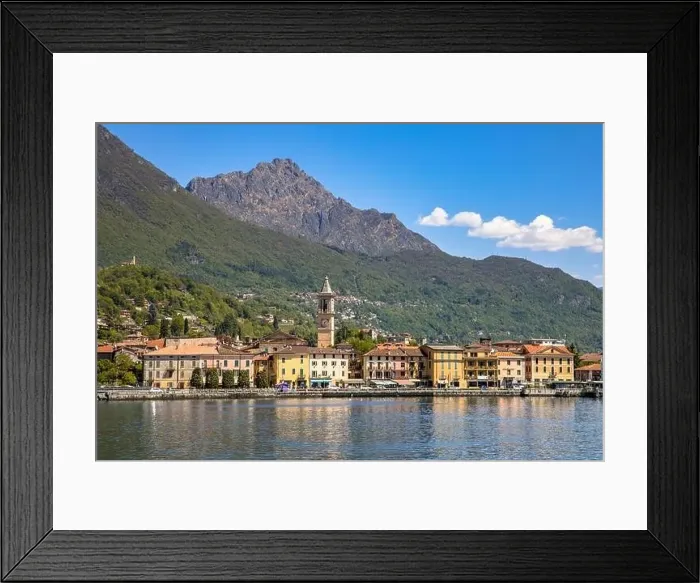Framed Print : View of city of Porlezza on the shore of lake Lugano With the Alps in the background seen from lake Framed Print : View of city of Porlezza on the shore of lake Lugano With the Alps in the background seen from lake
