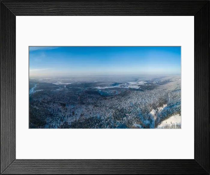 Framed Print : Aerial view of the forest and river at winter. The trees are covered with snow Framed Print : Aerial view of the forest and river at winter. The trees are covered with snow