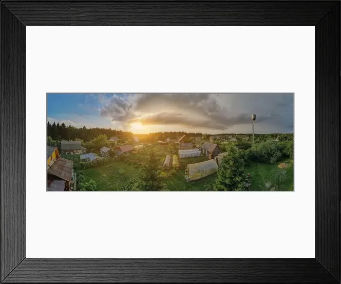 Framed Print : High View from the height of a flying drone, a small village with houses and cottages, green fields on a summer day