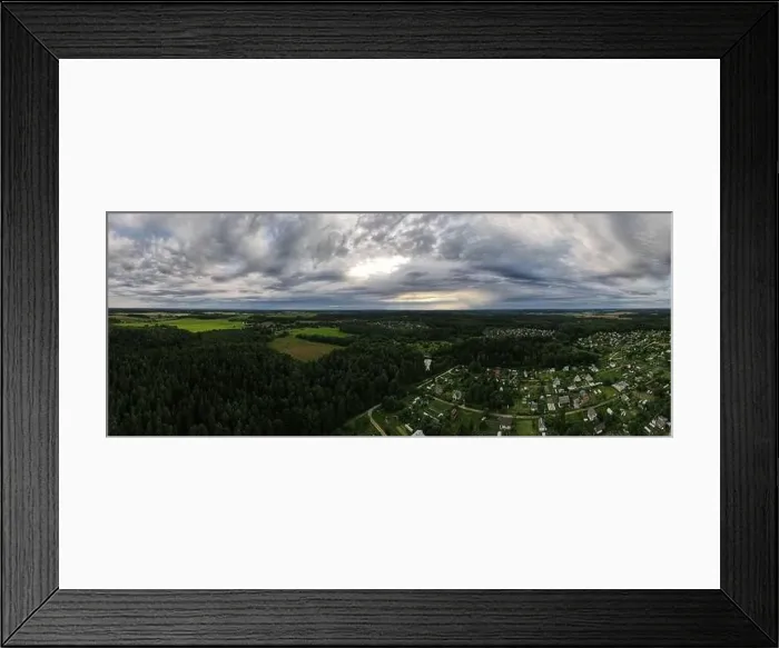 Framed Print : High View from the height of a flying drone, a small village with houses and cottages, green fields on a summer day Framed Print : High View from the height of a flying drone, a small village with houses and cottages, green fields on a summer day
