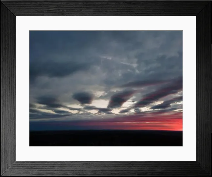 Framed Print : View from drone, panorama orange sky and gray clouds, sun at sunset Framed Print : View from drone, panorama orange sky and gray clouds, sun at sunset