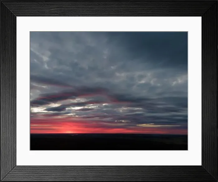 Framed Print : View from drone, panorama orange sky and gray clouds, sun at sunset Framed Print : View from drone, panorama orange sky and gray clouds, sun at sunset