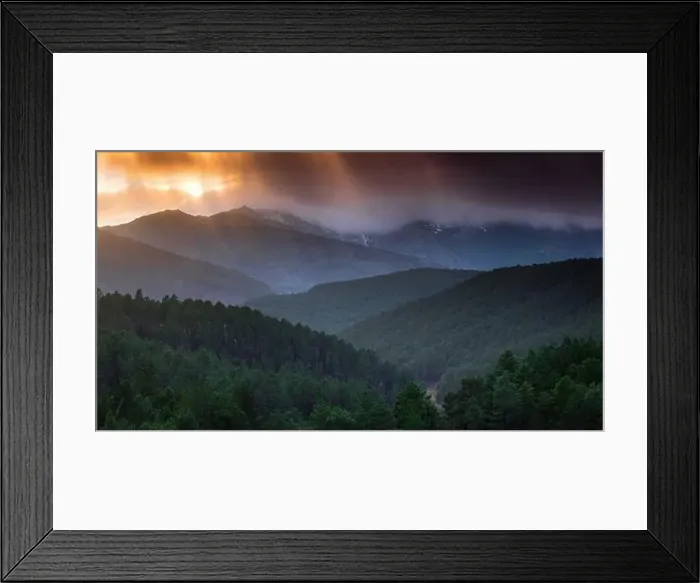 Framed Print : Majestic drone view of bright sun setting on cloudy evening sky over green hilly terrain Framed Print : Majestic drone view of bright sun setting on cloudy evening sky over green hilly terrain