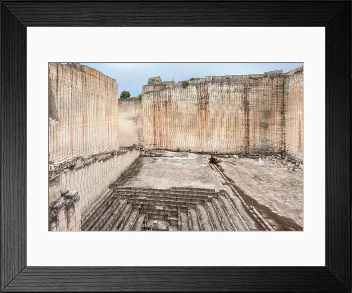 Framed Print : Amazing aerial view of walls and pit of rock quarry on sunny day on Menorca, Spain Framed Print : Amazing aerial view of walls and pit of rock quarry on sunny day on Menorca, Spain