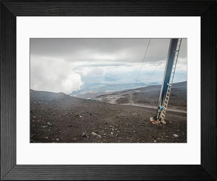 Framed Print : Top of crater Mount Etna volcano, frozen cold lava smokes, thick clouds Framed Print : Top of crater Mount Etna volcano, frozen cold lava smokes, thick clouds