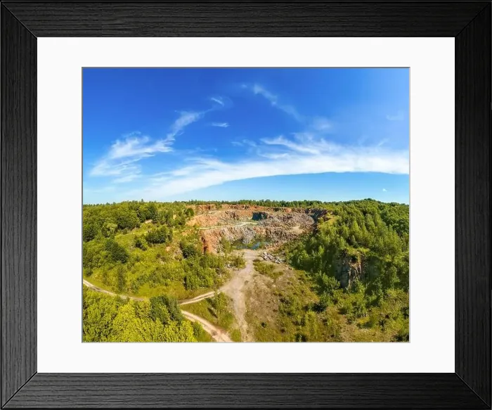 Framed Print : View from above of granite quarry in the forest. Mountain landscape on a summer sunny day Framed Print : View from above of granite quarry in the forest. Mountain landscape on a summer sunny day