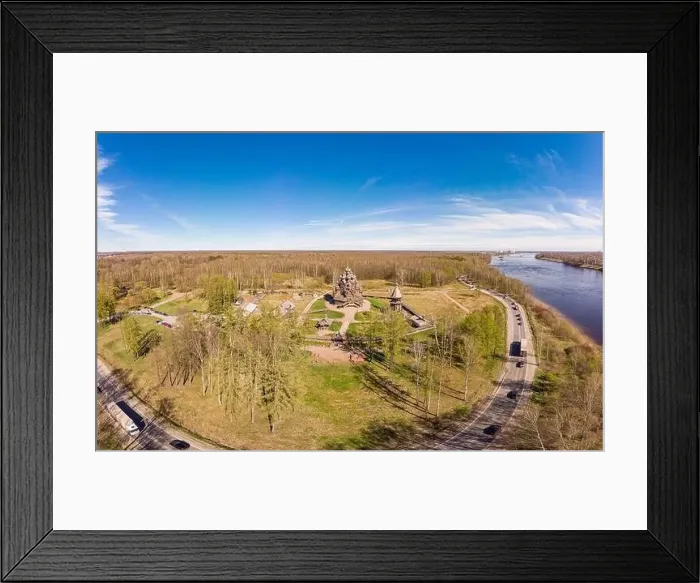 Framed Print : Beautiful Aerial view to traditional Russian village with orthodox wooden chapel and bell tower in Bogoslovka manor Framed Print : Beautiful Aerial view to traditional Russian village with orthodox wooden chapel and bell tower in Bogoslovka manor