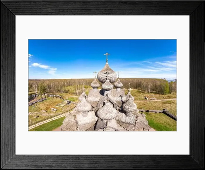 Framed Print : Beautiful Aerial view to traditional Russian village with orthodox wooden chapel and bell tower in Bogoslovka manor
