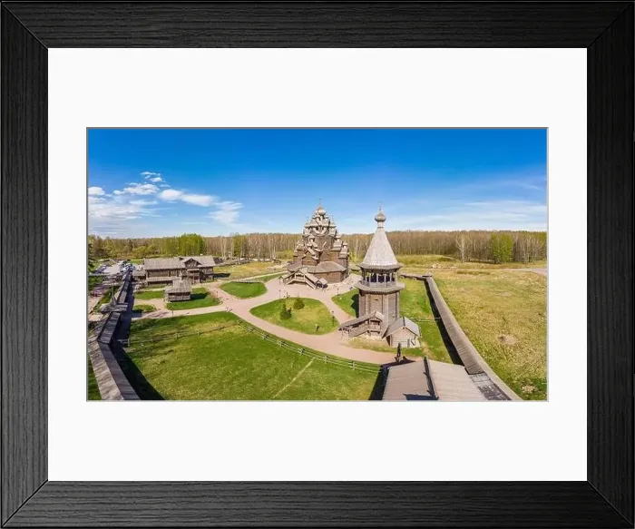 Framed Print : Beautiful Aerial view to traditional Russian village with orthodox wooden chapel and bell tower in Bogoslovka manor Framed Print : Beautiful Aerial view to traditional Russian village with orthodox wooden chapel and bell tower in Bogoslovka manor