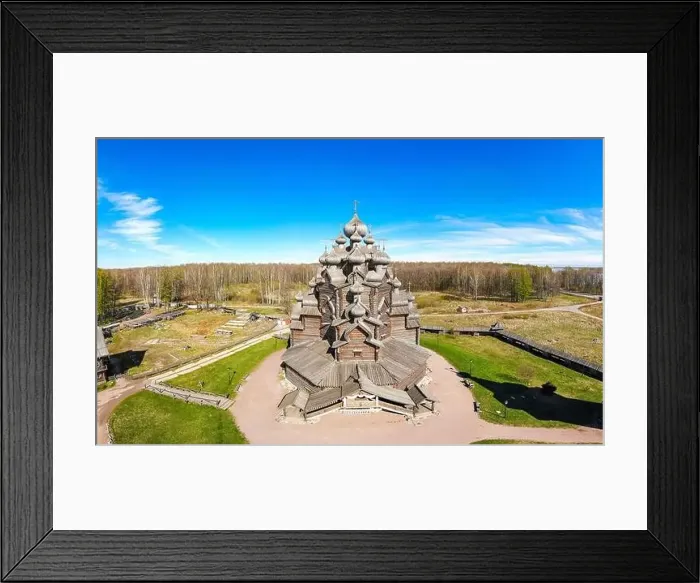 Framed Print : Beautiful Aerial view to traditional Russian village with orthodox wooden chapel and bell tower in Bogoslovka manor Framed Print : Beautiful Aerial view to traditional Russian village with orthodox wooden chapel and bell tower in Bogoslovka manor