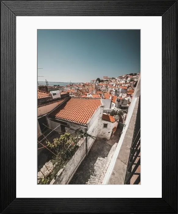 Framed Print : LISBON, PORTUGAL - MAY 7, 2018: view to town with orange roofs in Lisbon, Portugal Framed Print : LISBON, PORTUGAL - MAY 7, 2018: view to town with orange roofs in Lisbon, Portugal