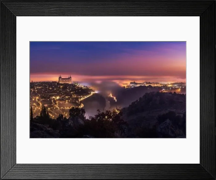Framed Print : From above amazing scenery of illuminated ancient Alcazar de Toledo castle over town in misty twilight Framed Print : From above amazing scenery of illuminated ancient Alcazar de Toledo castle over town in misty twilight