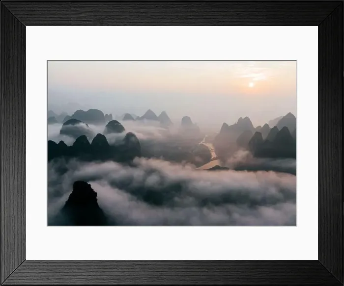Framed Print : Mysterious river landscape among high mountains in haze Framed Print : Mysterious river landscape among high mountains in haze