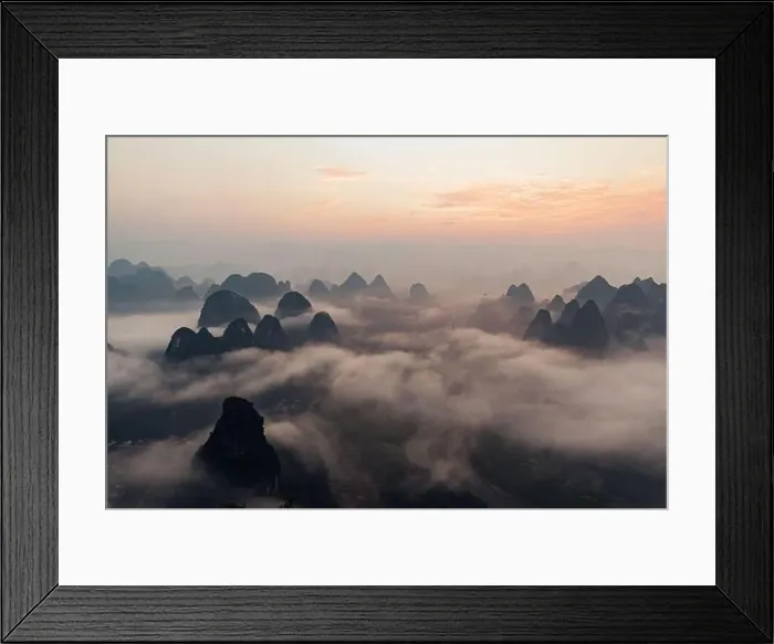 Framed Print : Mysterious river landscape among high mountains in haze Framed Print : Mysterious river landscape among high mountains in haze