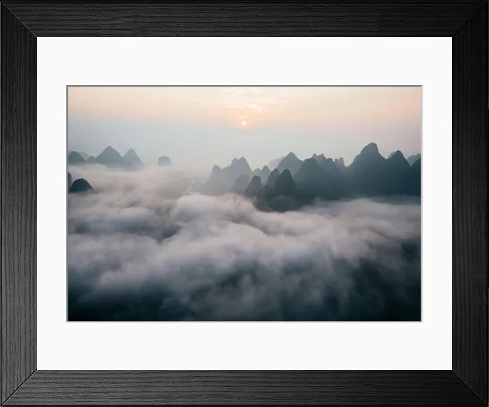 Framed Print : Mysterious river landscape among high mountains in haze Framed Print : Mysterious river landscape among high mountains in haze
