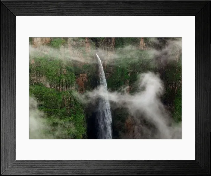 Framed Print : Drone view of amazing landscape of waterfall with rapid water falling down rocky canyon Framed Print : Drone view of amazing landscape of waterfall with rapid water falling down rocky canyon