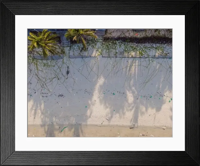 Framed Print : Sandy beach with Plastic garbage Framed Print : Sandy beach with Plastic garbage