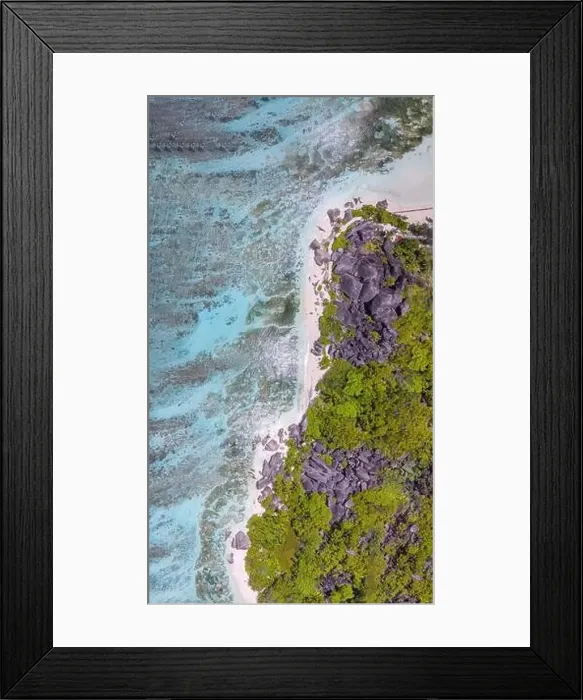 Framed Print : Anse Source Argent, La Digue. Downward aerial view of tropical coastline and granite rocks Framed Print : Anse Source Argent, La Digue. Downward aerial view of tropical coastline and granite rocks