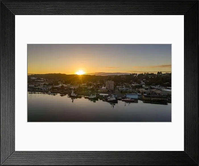 Framed Print : Beautiful orange sunset with sun star over Coos Bay, Oregon in United States Framed Print : Beautiful orange sunset with sun star over Coos Bay, Oregon in United States