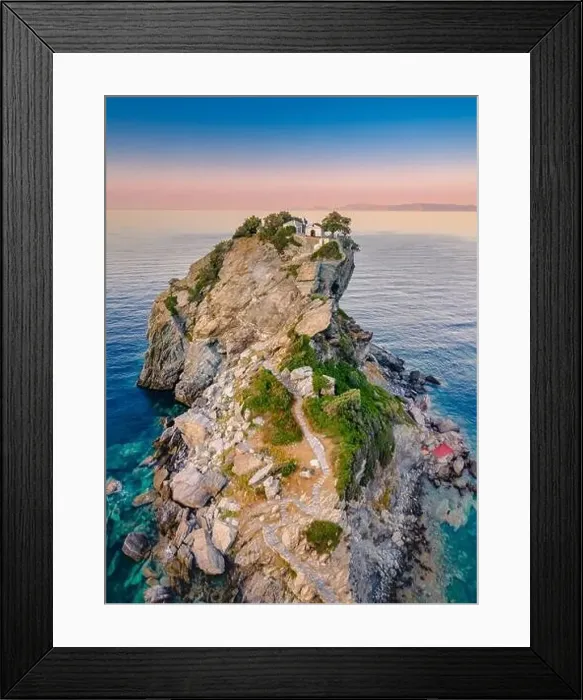 Framed Print : Aerial view of the famous small church Agios Ioannis in Skopelos island, Greece Framed Print : Aerial view of the famous small church Agios Ioannis in Skopelos island, Greece