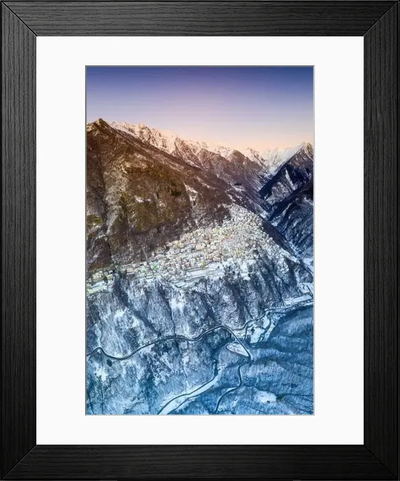 Framed Print : Aerial panoramic by drone of Premana village during winter dusk, Valsassina, Lecco province, Lombardy, Italy, Europe Framed Print : Aerial panoramic by drone of Premana village during winter dusk, Valsassina, Lecco province, Lombardy, Italy, Europe