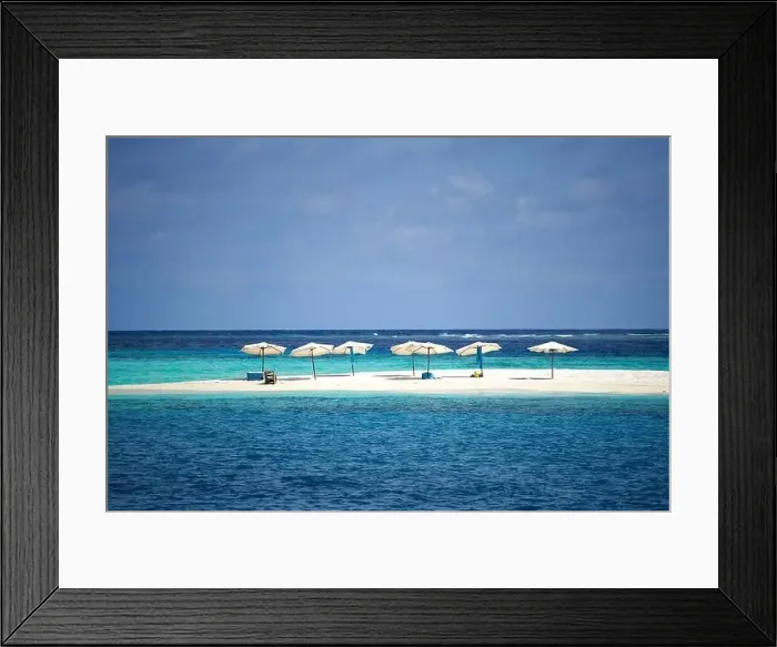 Framed Print : Sand bank with umbrellas in Maldives Framed Print : Sand bank with umbrellas in Maldives