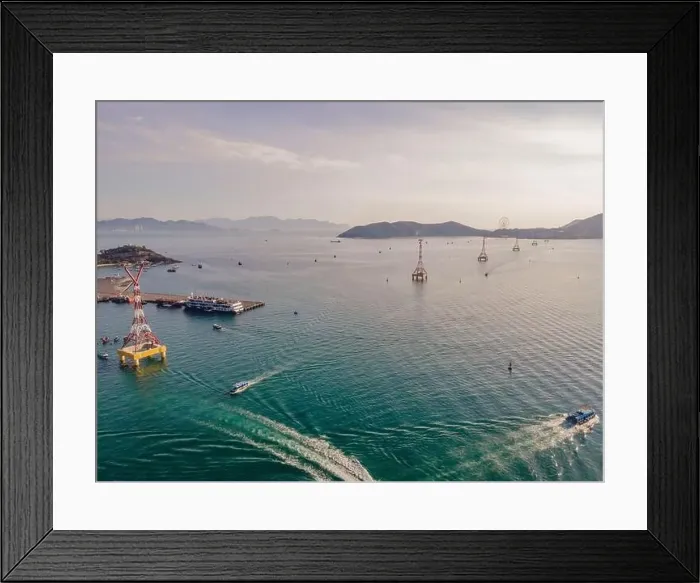 Framed Print : The cable car at Nha Trang beach. Aerial view from drone Framed Print : The cable car at Nha Trang beach. Aerial view from drone