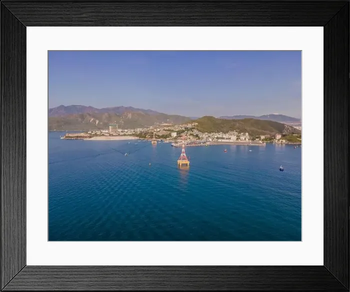 Framed Print : The cable car at Nha Trang beach. Aerial view from drone Framed Print : The cable car at Nha Trang beach. Aerial view from drone