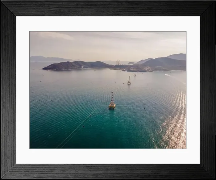 Framed Print : The cable car at Nha Trang beach. Aerial view from drone Framed Print : The cable car at Nha Trang beach. Aerial view from drone