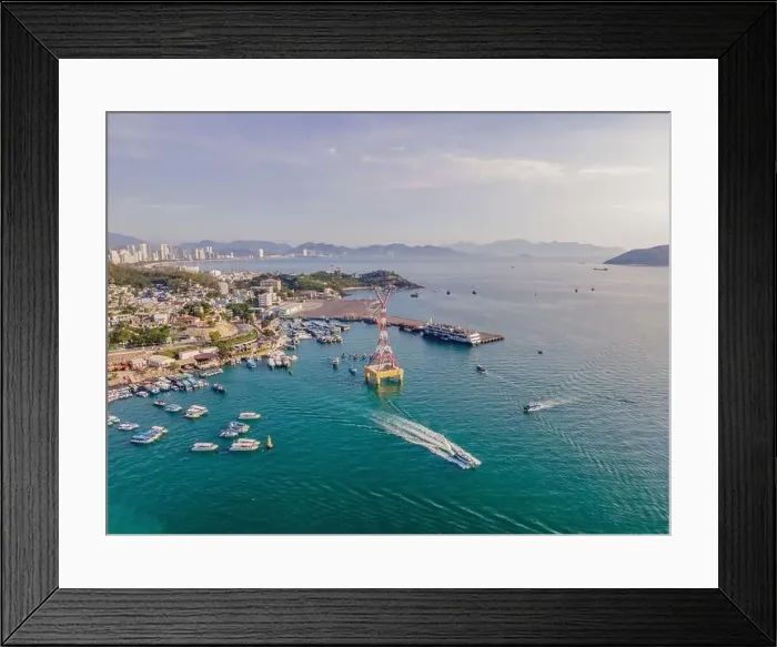 Framed Print : The cable car at Nha Trang beach. Aerial view from drone Framed Print : The cable car at Nha Trang beach. Aerial view from drone